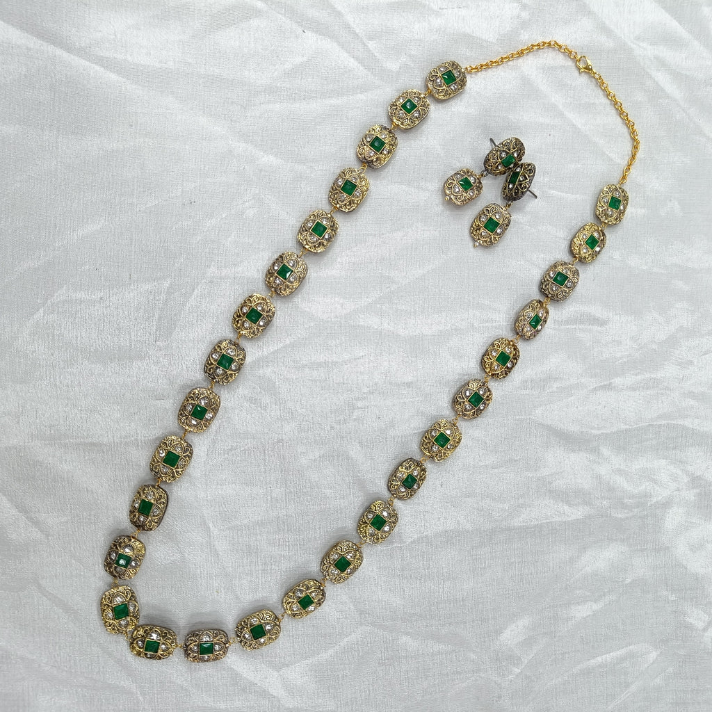 Haritika Brass Fusion Long Jewellery Set with Green Beads | JewelOn