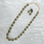 Haritika Brass Fusion Long Jewellery Set with Green Beads | JewelOn