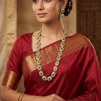 Haritika Brass Fusion Long Jewellery Set with Green Beads | JewelOn