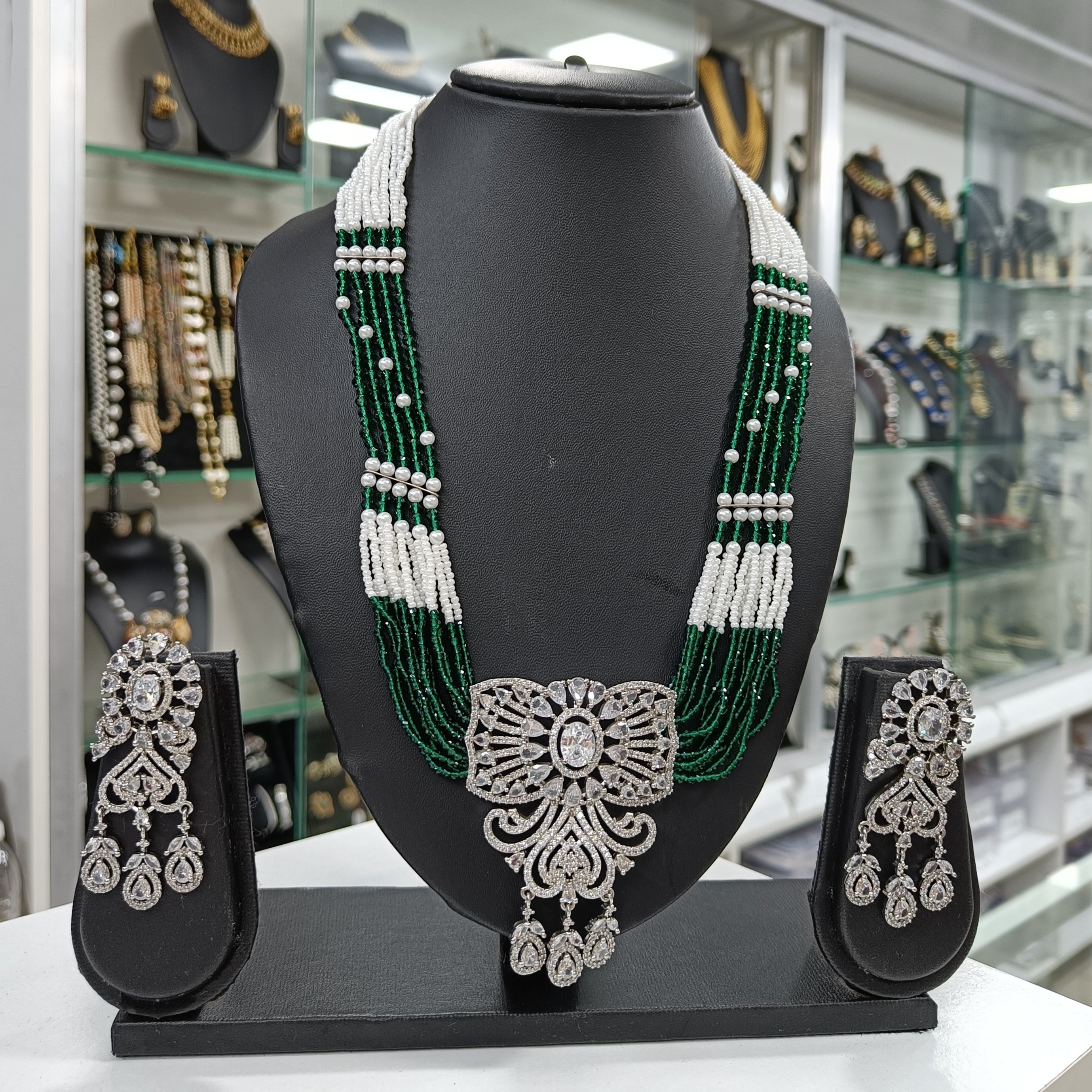 Haritamani American Diamond Pendant Green Moti Long Necklace Set | JewelOn