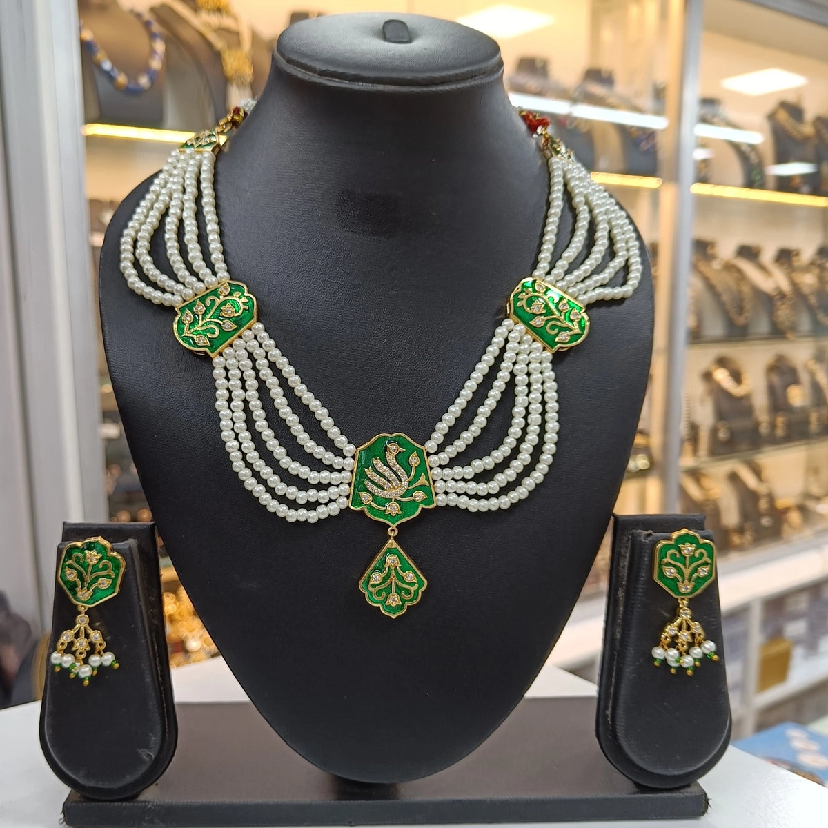 Navya Meena American Diamond White Moti Green Necklace Set