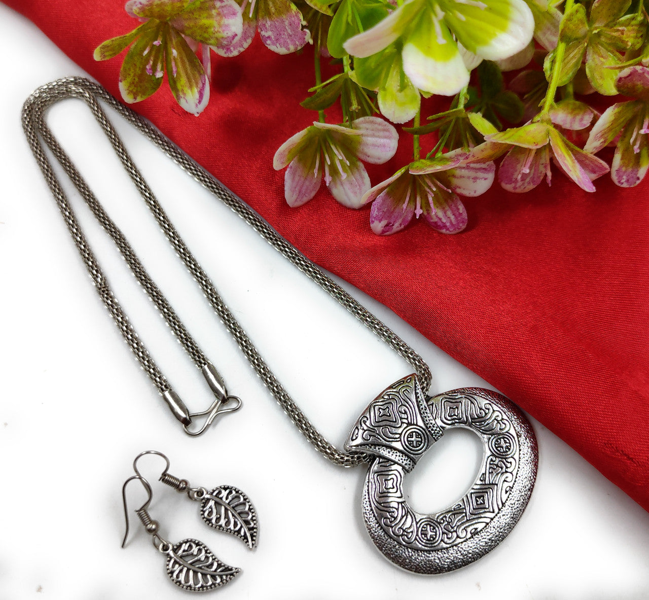 Kalapi Oval Oxidised Pendant Necklace Earring Set | JewelOn
