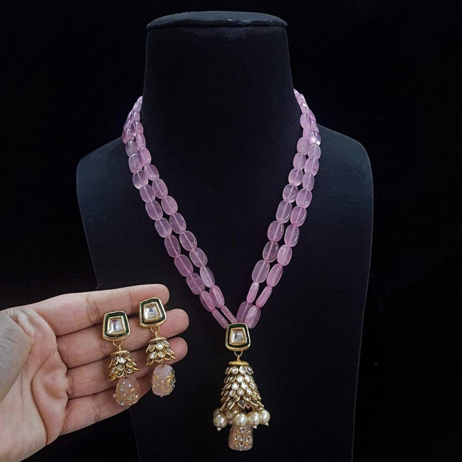 JewelOn baby pink Monalisa bead long necklace with Kundan pendant and matching earrings. Gold-plated.