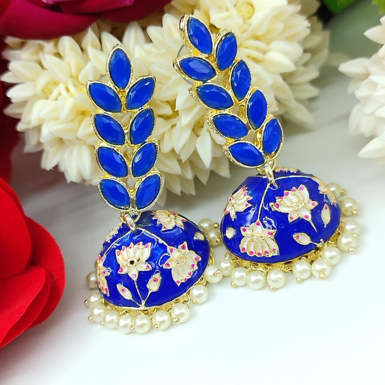 JewelOn blue Meenakari jhumka earrings with white floral design and pearl drops. Gold-tone metal with blue gemstone accents.