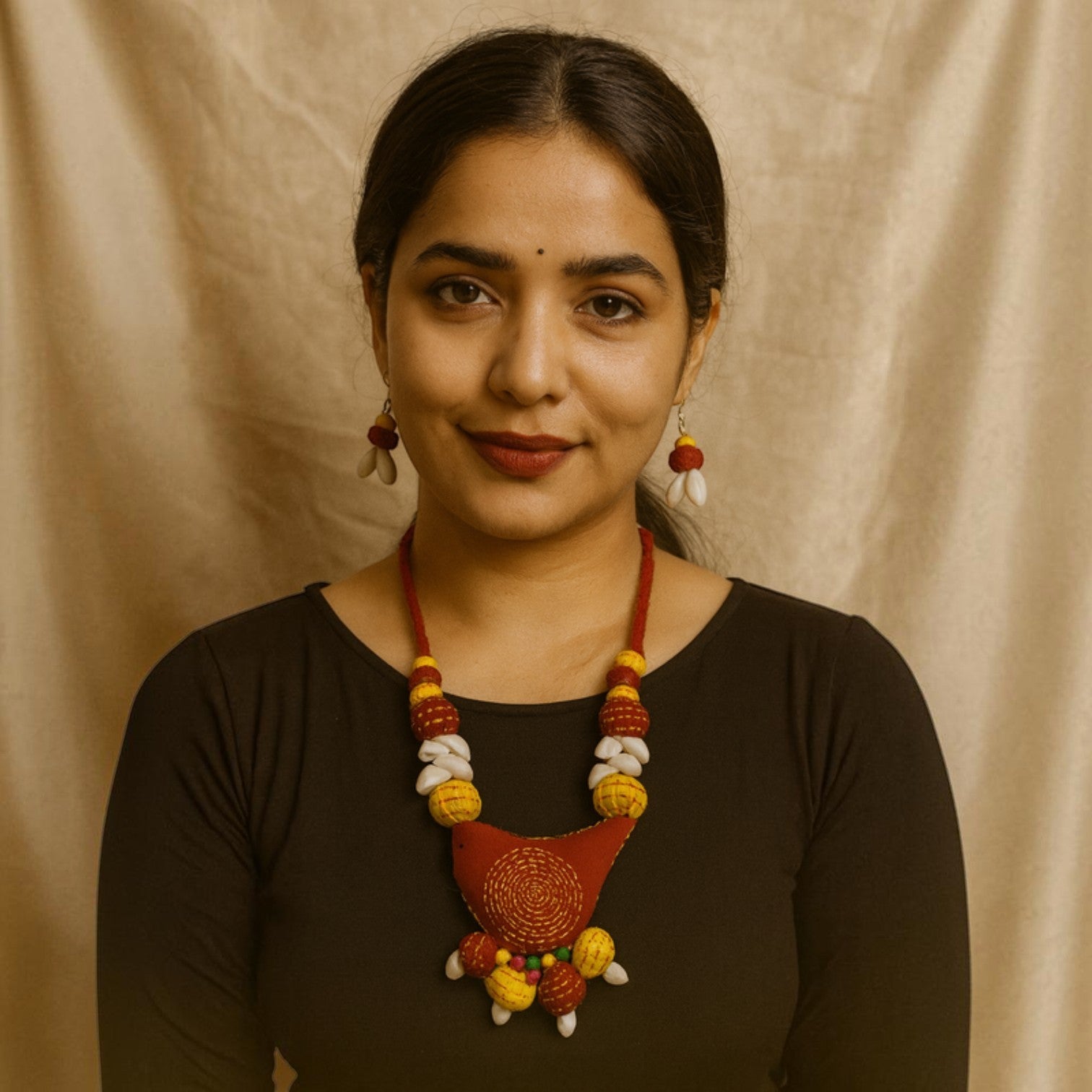 JewelOn red fabric necklace with yellow and white shell accents, matching earrings. Handmade jewellery.