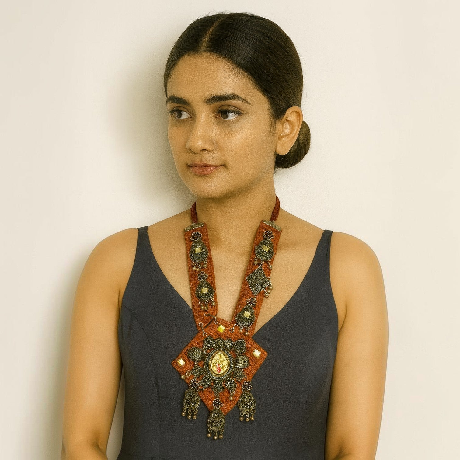 JewelOn Fiona Classy Red Handmade Navratri oxidised fabric fusion jewellery with intricate metalwork and dangling charms.