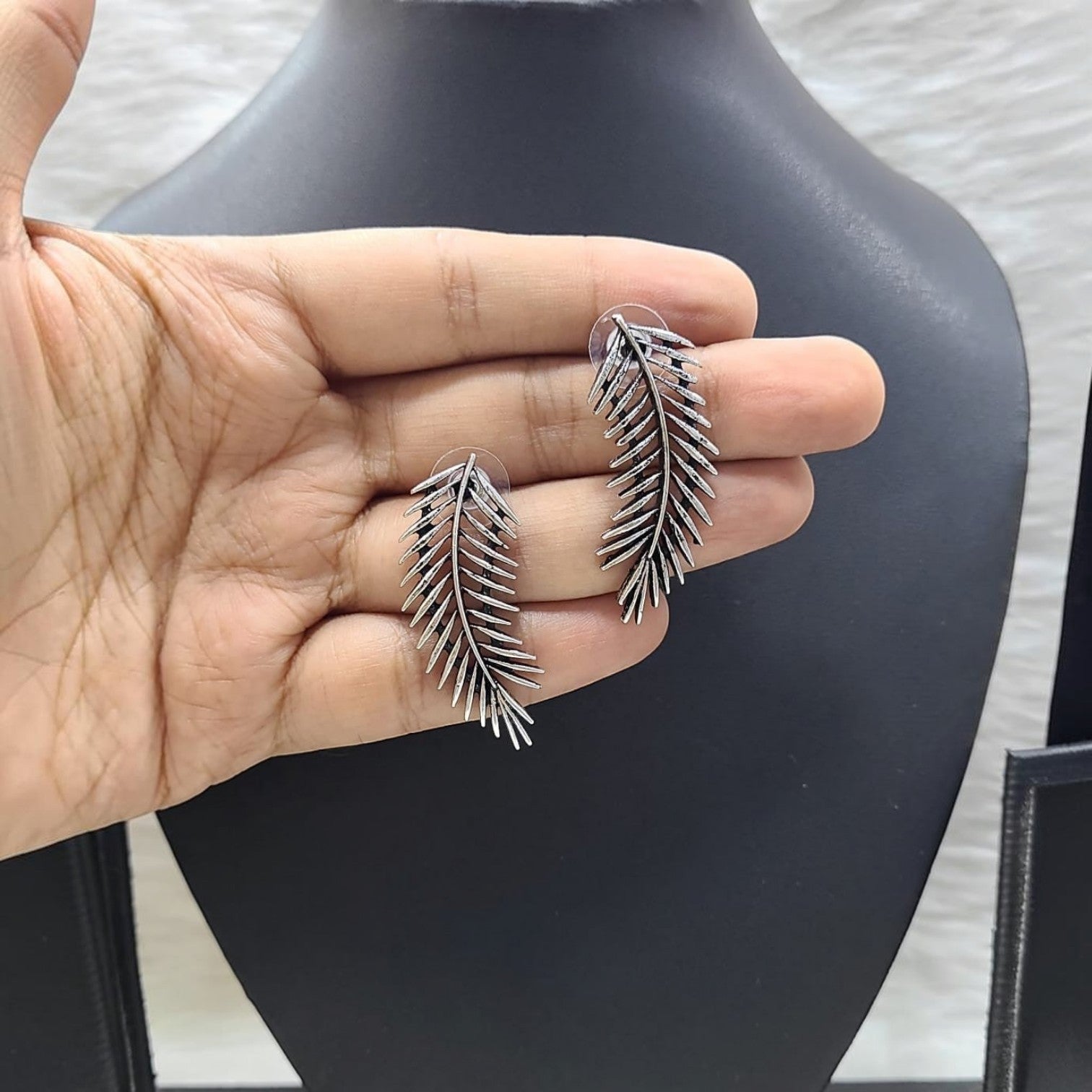 JewelOn German silver leaf-shaped drop earrings with an oxidised finish.
