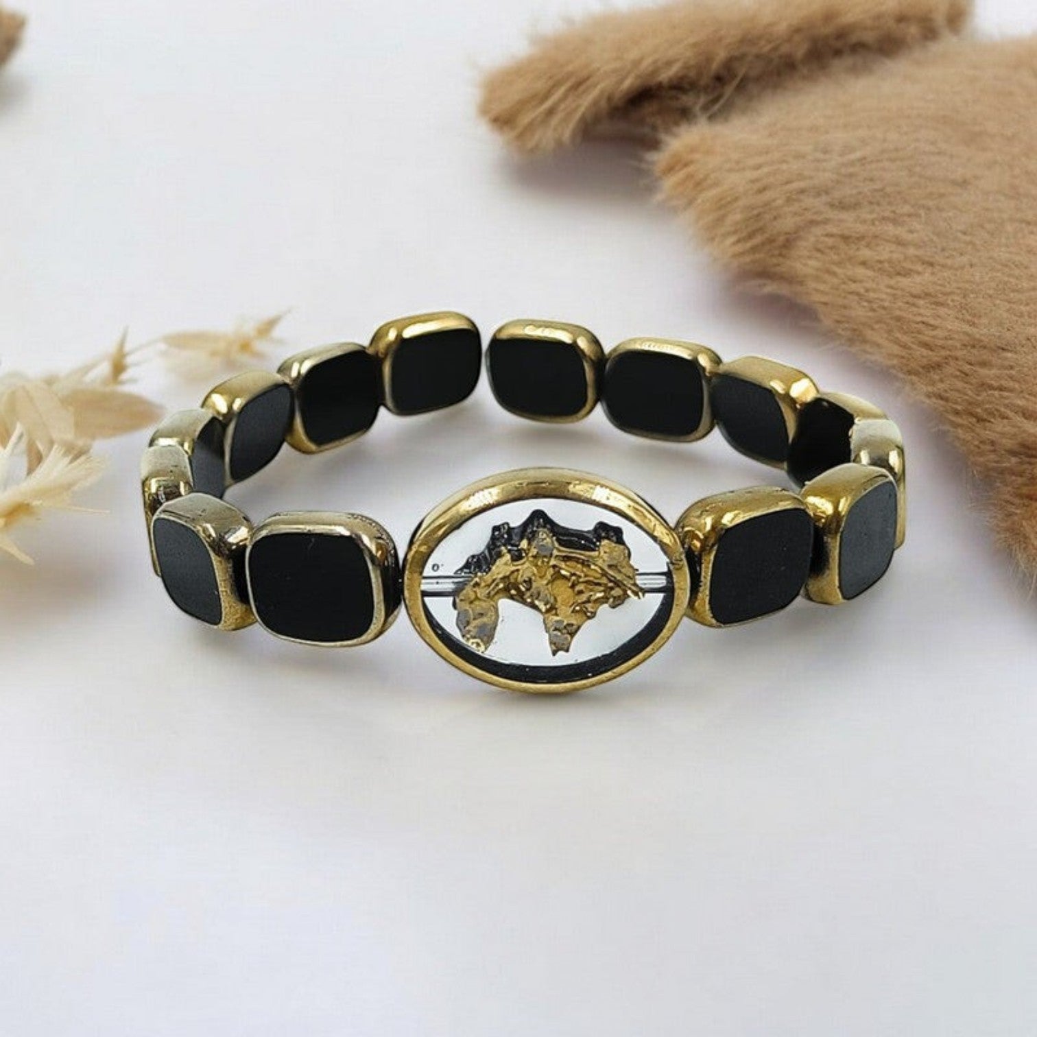 JewelOn gold and black glass bead bracelet with oval centerpiece featuring a gold horse design.