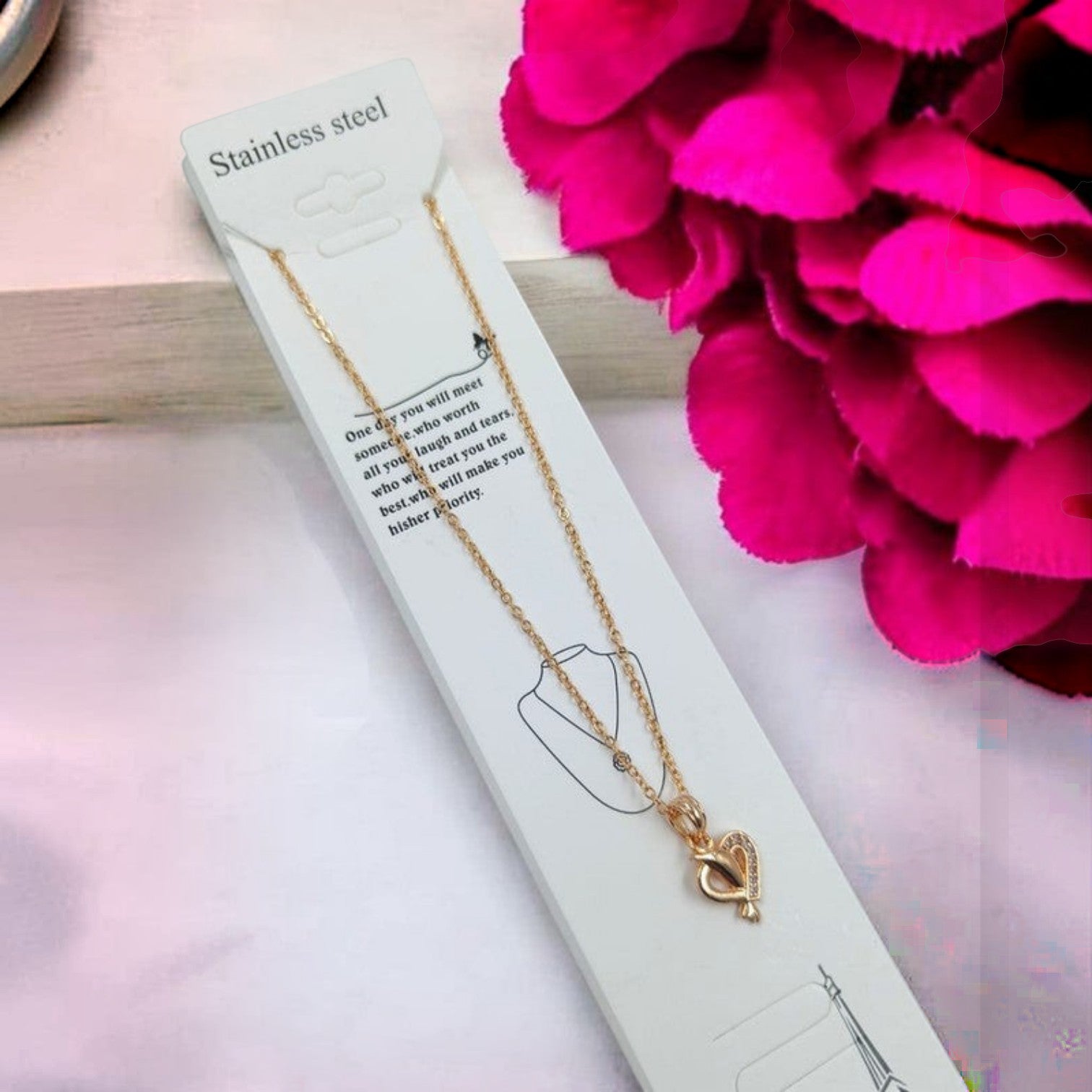 JewelOn gold-tone brass pendant chain necklace with a sparkling heart-shaped pendant, perfect for women and girls.