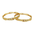 JewelOn gold plated artificial bangles set with intricate floral cutwork and colorful gemstone accents.