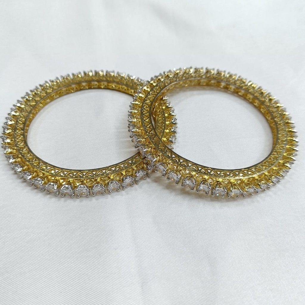 JewelOn gold-plated kada bangle with clear AD stones and intricate detailing. Traditional Indian jewelry.