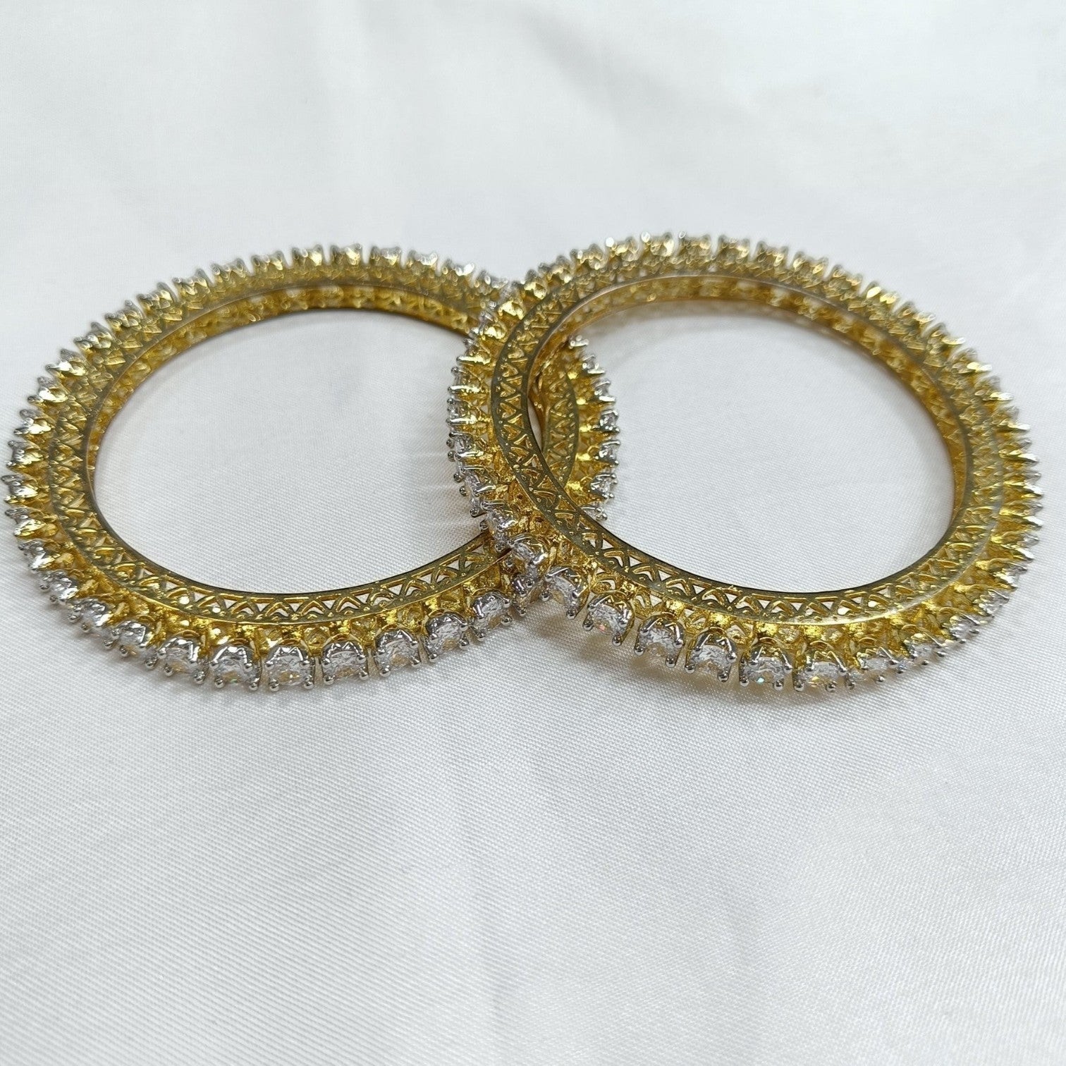 JewelOn gold-plated kada bangle with clear AD stones and intricate detailing. Traditional Indian jewelry.