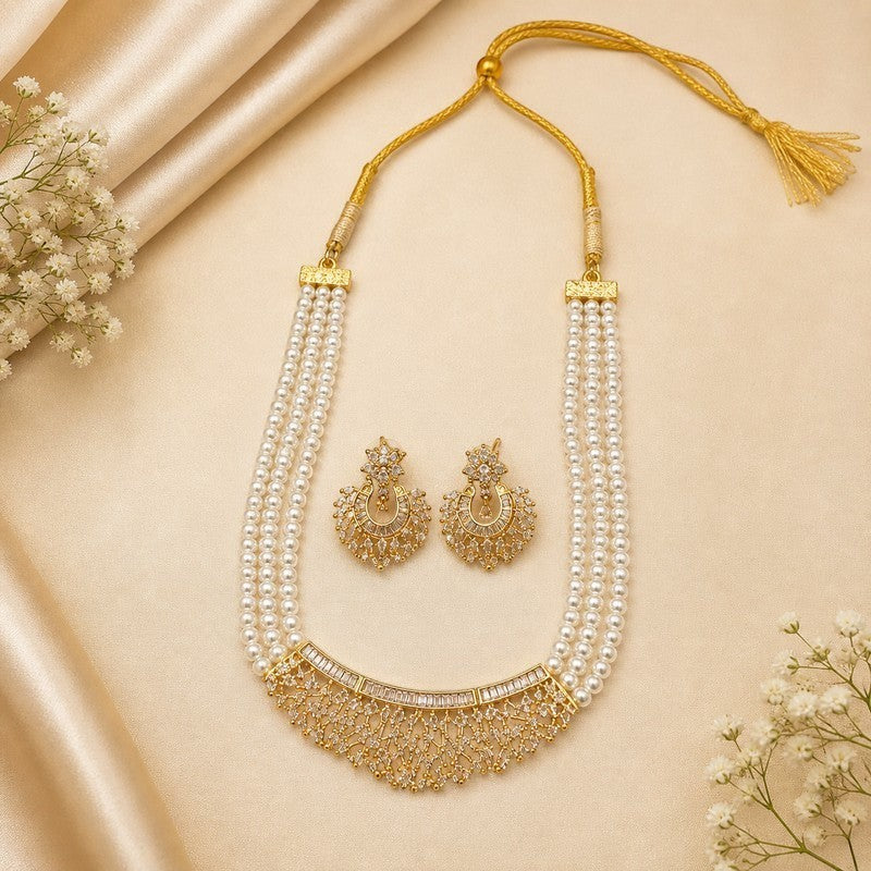 JewelOn gold plated long necklace set with three strands of faux pearls and a statement pendant adorned with AD stones and matching chandelier earrings.