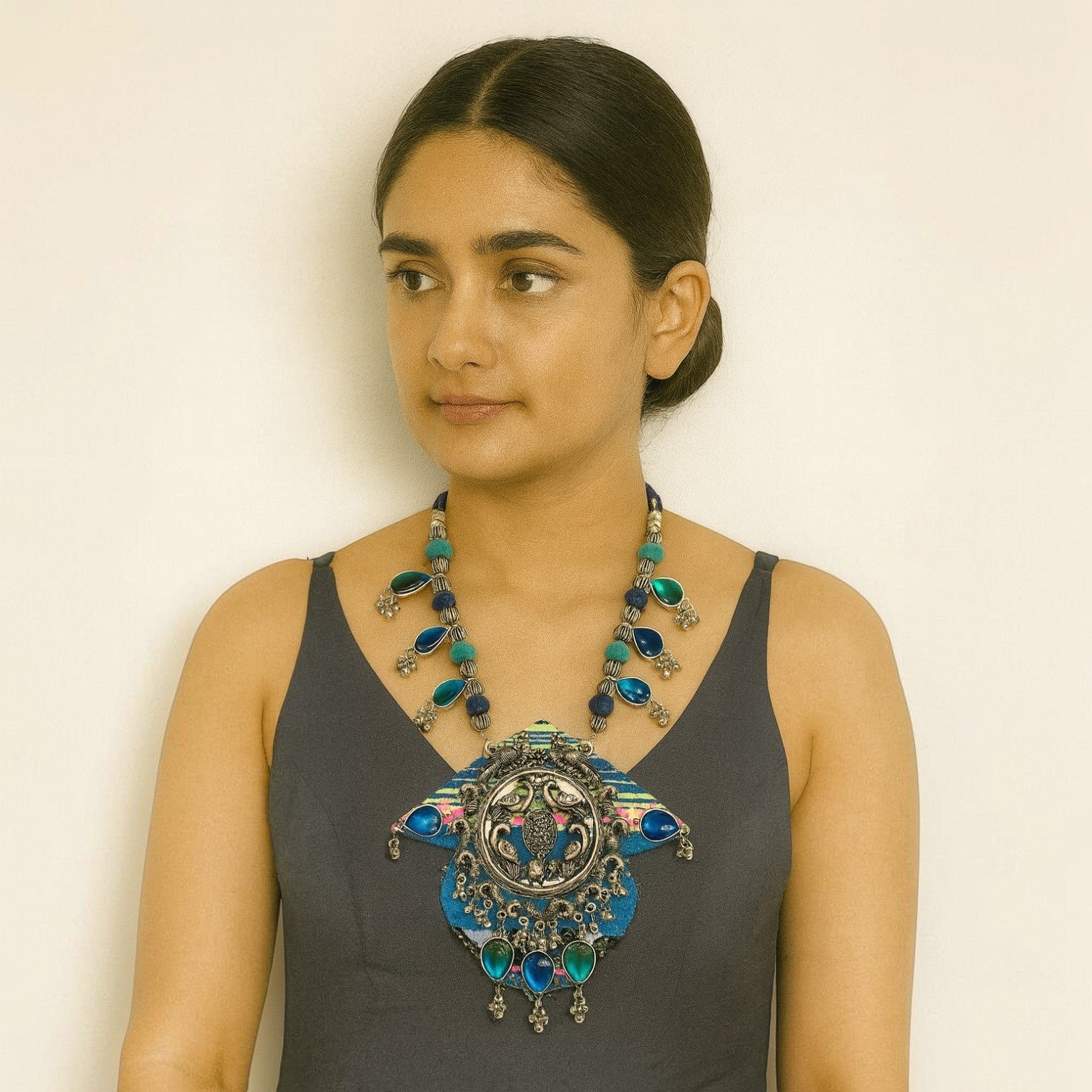 JewelOn Kiara Classy Blue Handmade Navratri oxidised fabric fusion jewellery with peacock motif and blue stones.