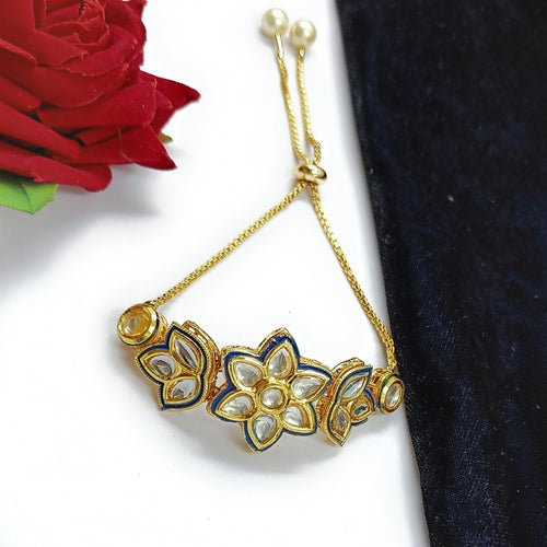 JewelOn gold adjustable bracelet with blue enamel and kundan stones in a floral design. Features pearl accents.