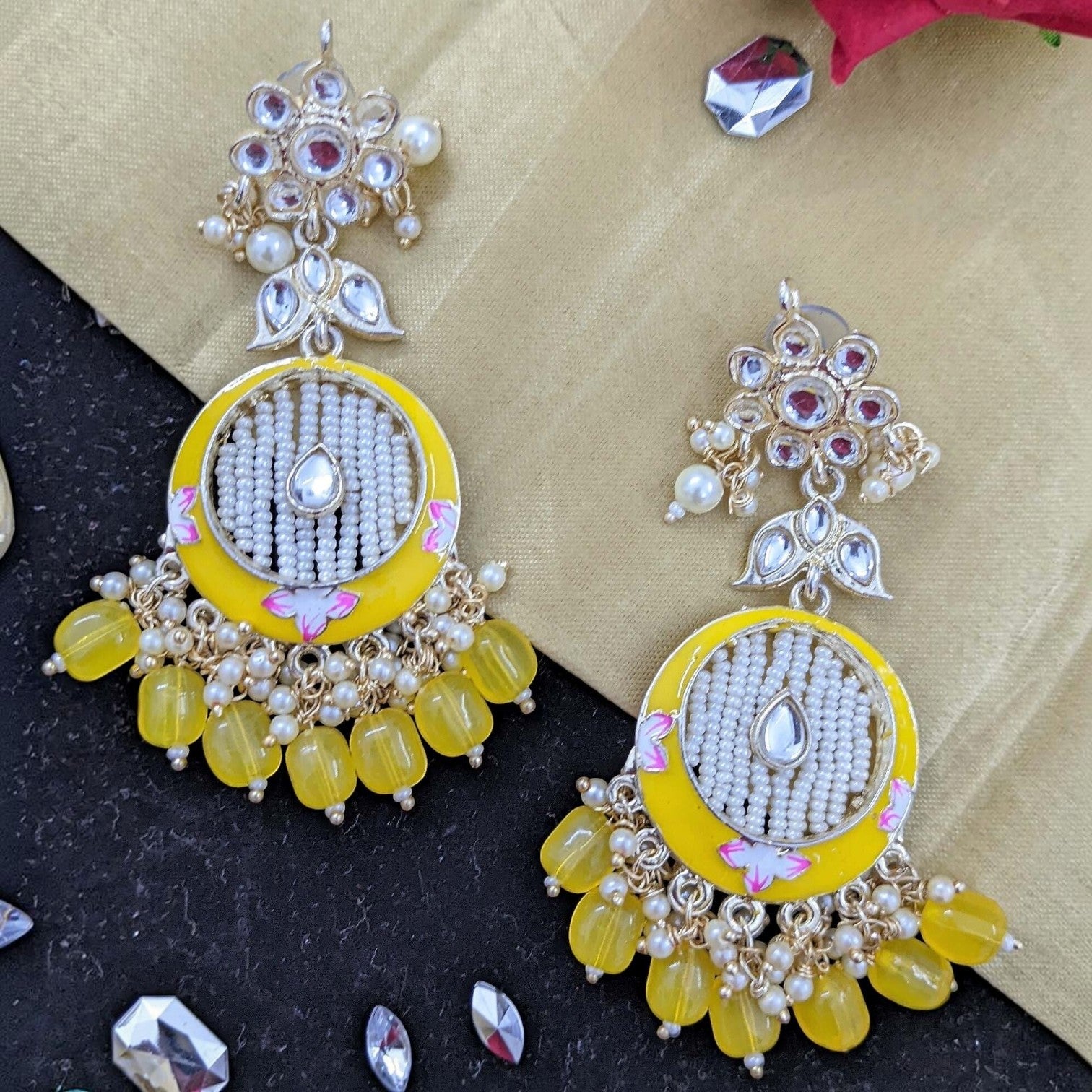 JewelOn Kundan Meenakari earrings with yellow enamel, white beads, pearls, and yellow drop beads.