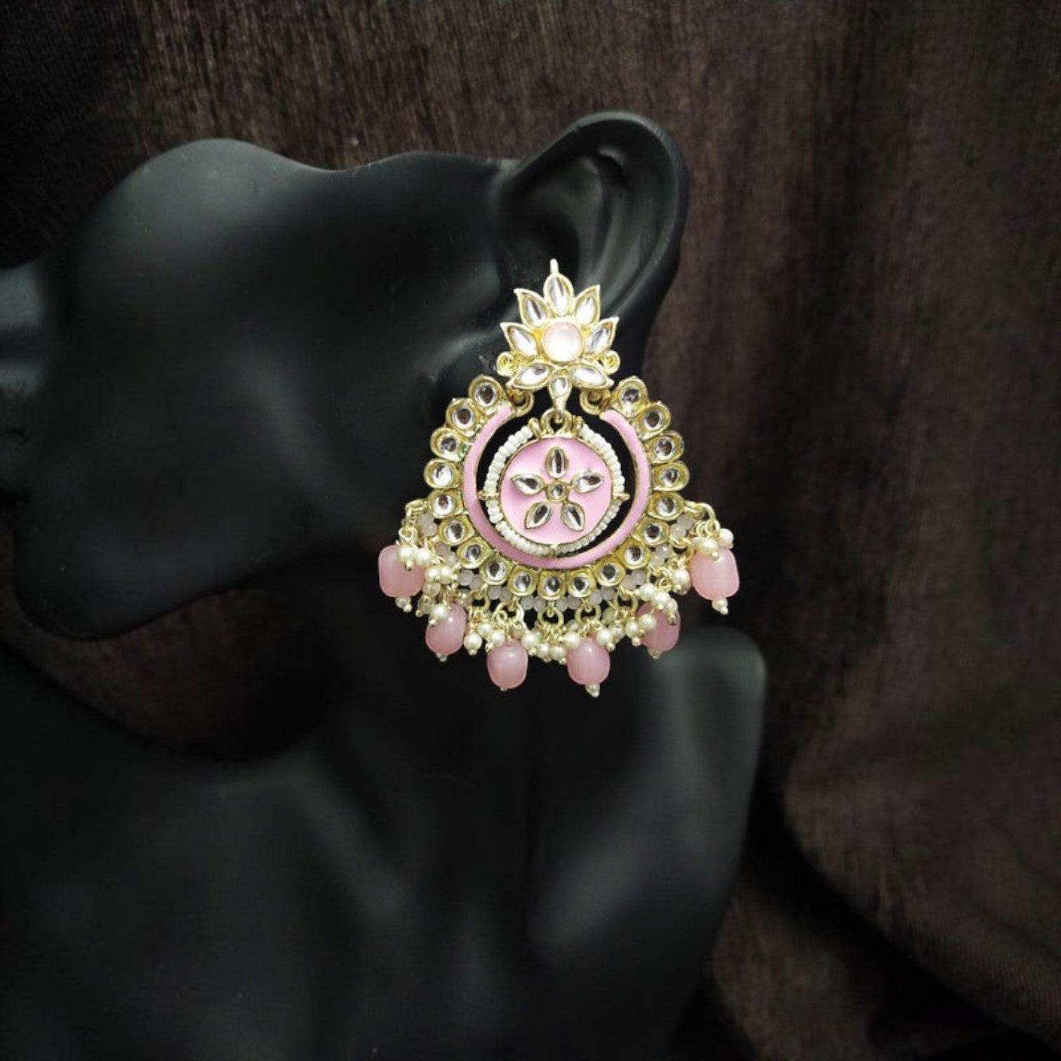 JewelOn baby pink Meenakari earrings with gold trim, pearl accents, and floral motif. Traditional Indian jewelry.