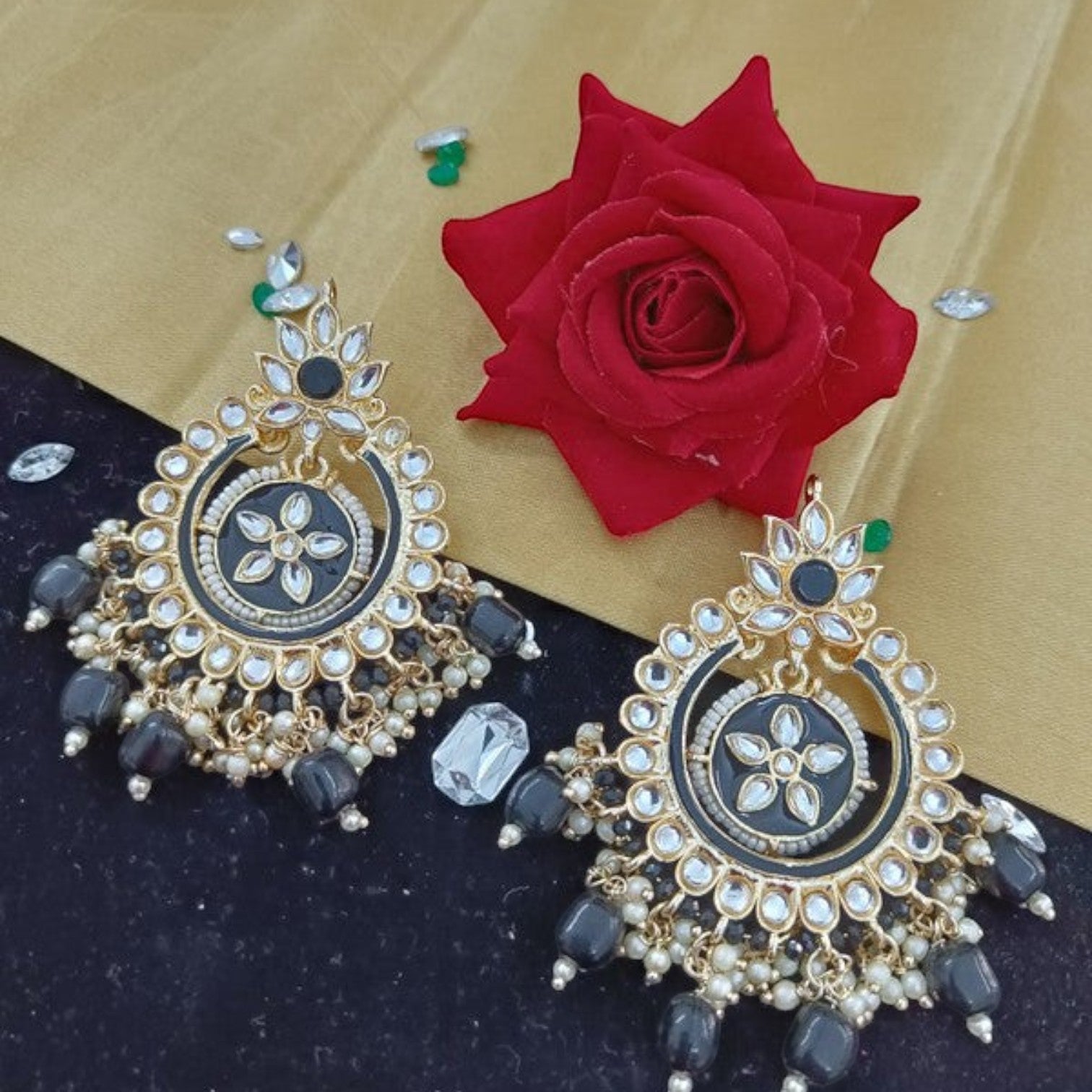 JewelOn Meenakari earrings with black and cream enamel, gold tone, and pearl accents. Dangle style with floral motif.