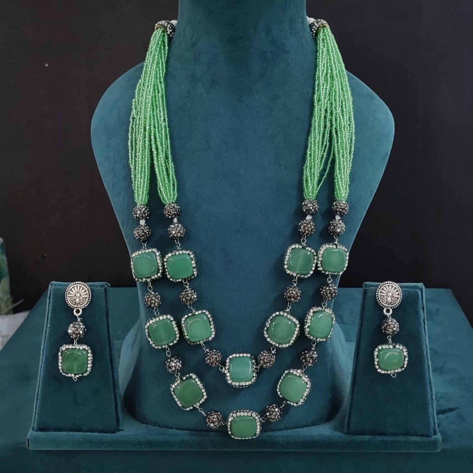JewelOn mint green semiprecious stone necklace and earring set with gold-plated metal and intricate detailing.