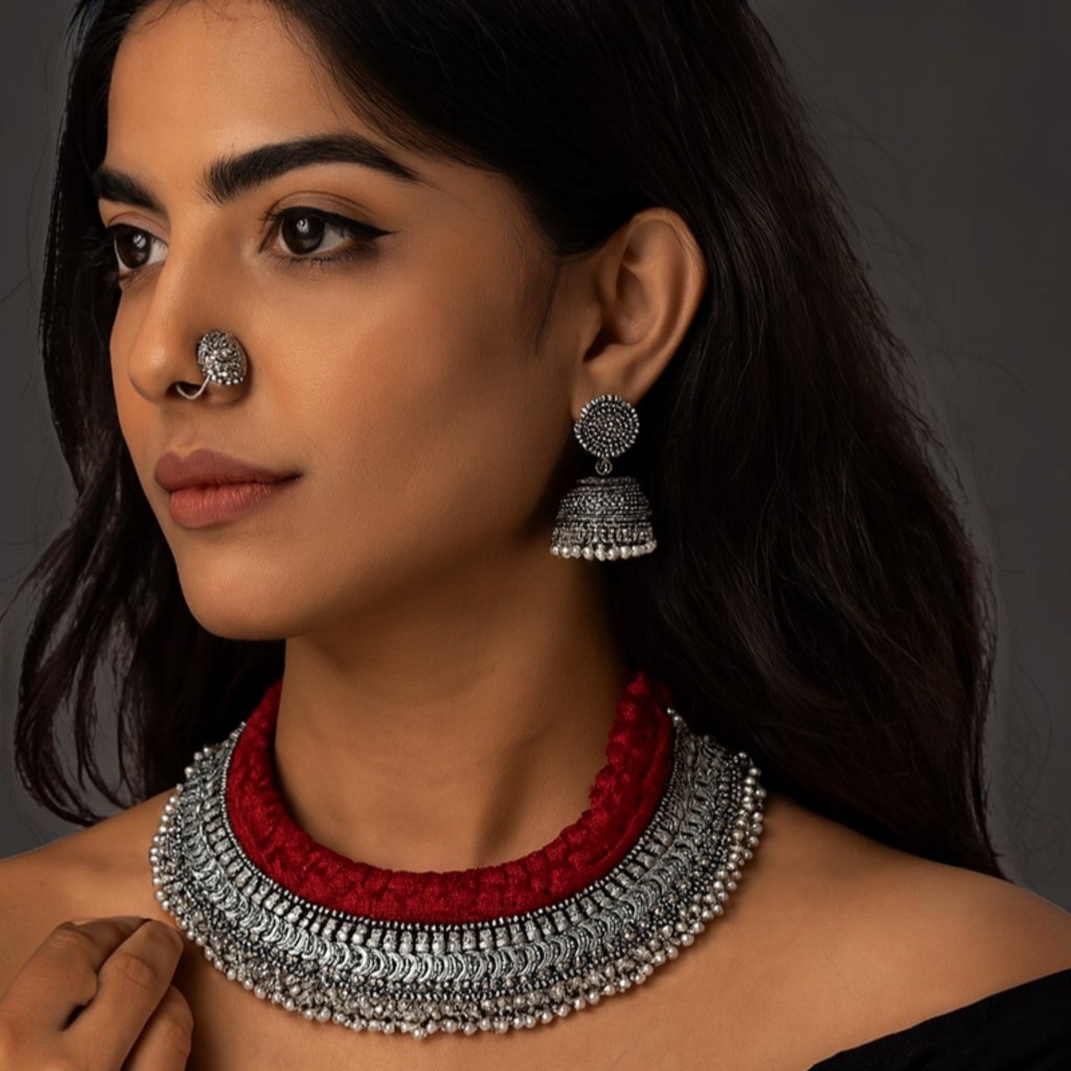 JewelOn Navya oxidised necklace and jhumka earrings set with maroon fabric and silver detailing.