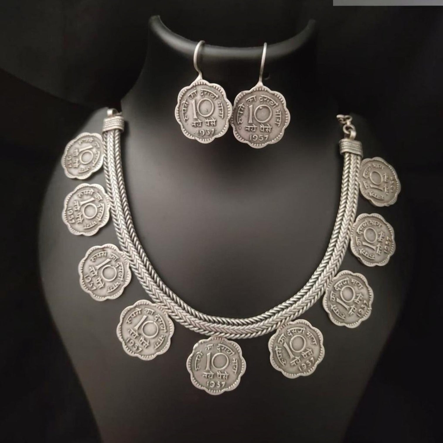 JewelOn Avni Dazzling Delight necklace and earrings set with 1957 coin motifs in silver polish.