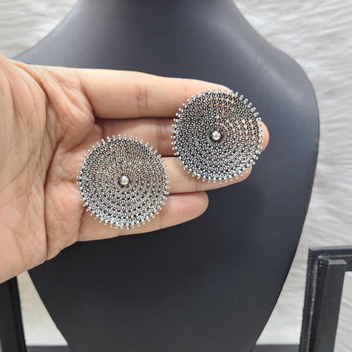 JewelOn Exclusive German Silver Oxidised Round Earrings with intricate filigree design and central bead.