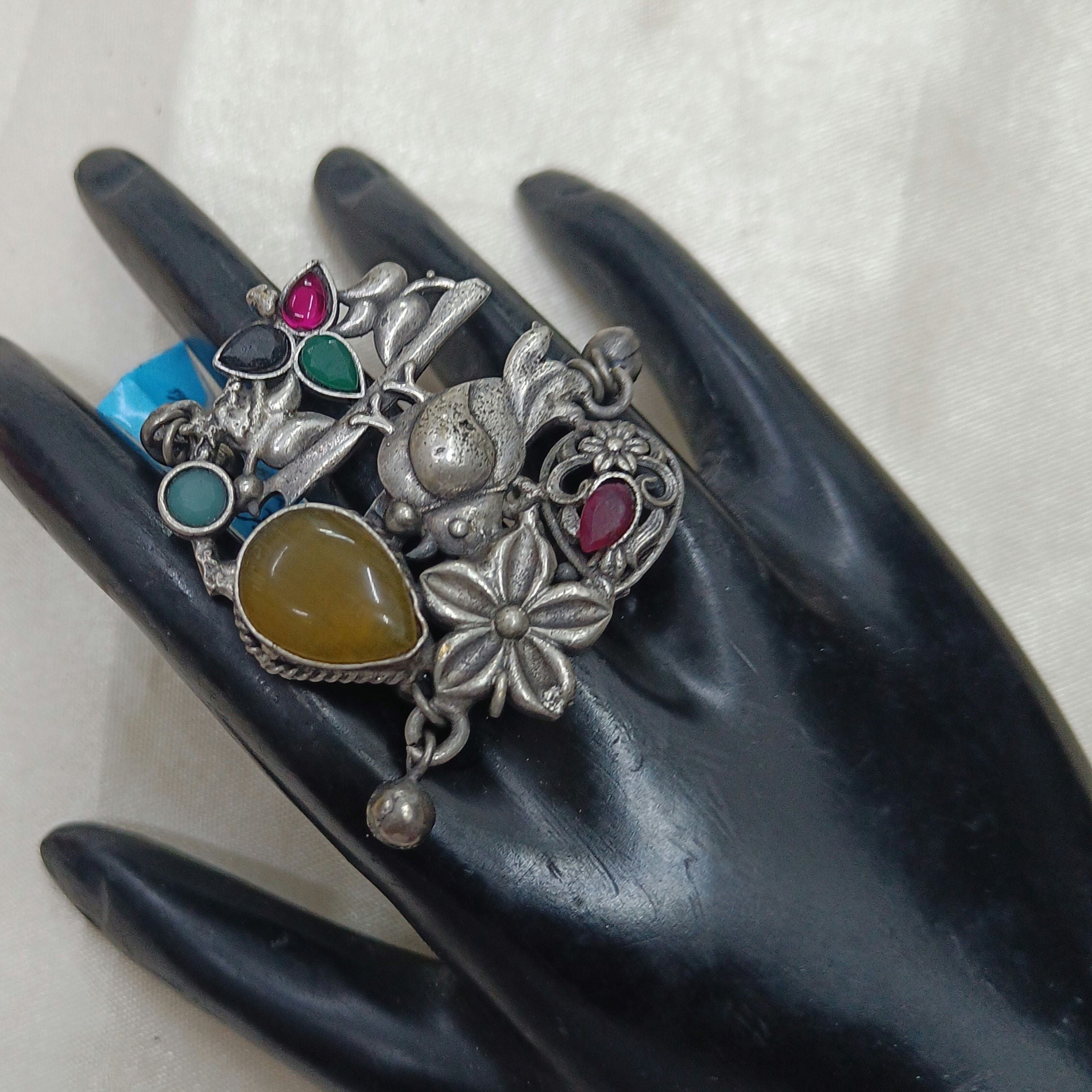 JewelOn Prisha ring with oxidised silver plating, featuring a large yellow teardrop stone and colourful accent stones.