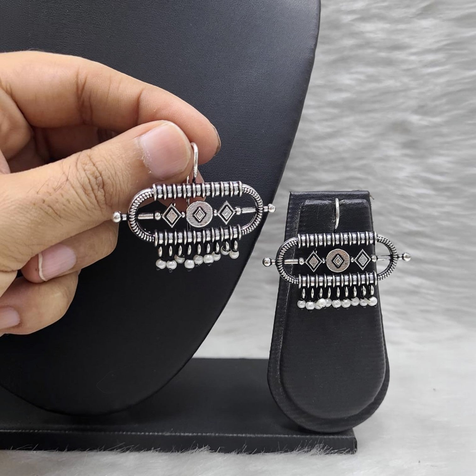 JewelOn fashionable oxidized German silver earrings with geometric patterns and pearl drops.