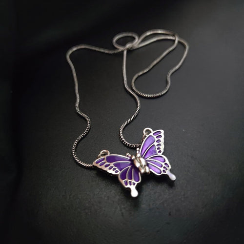 Jewelon Ethereal Detail Magnetic Pendant Necklace with purple butterfly design and silver chain.