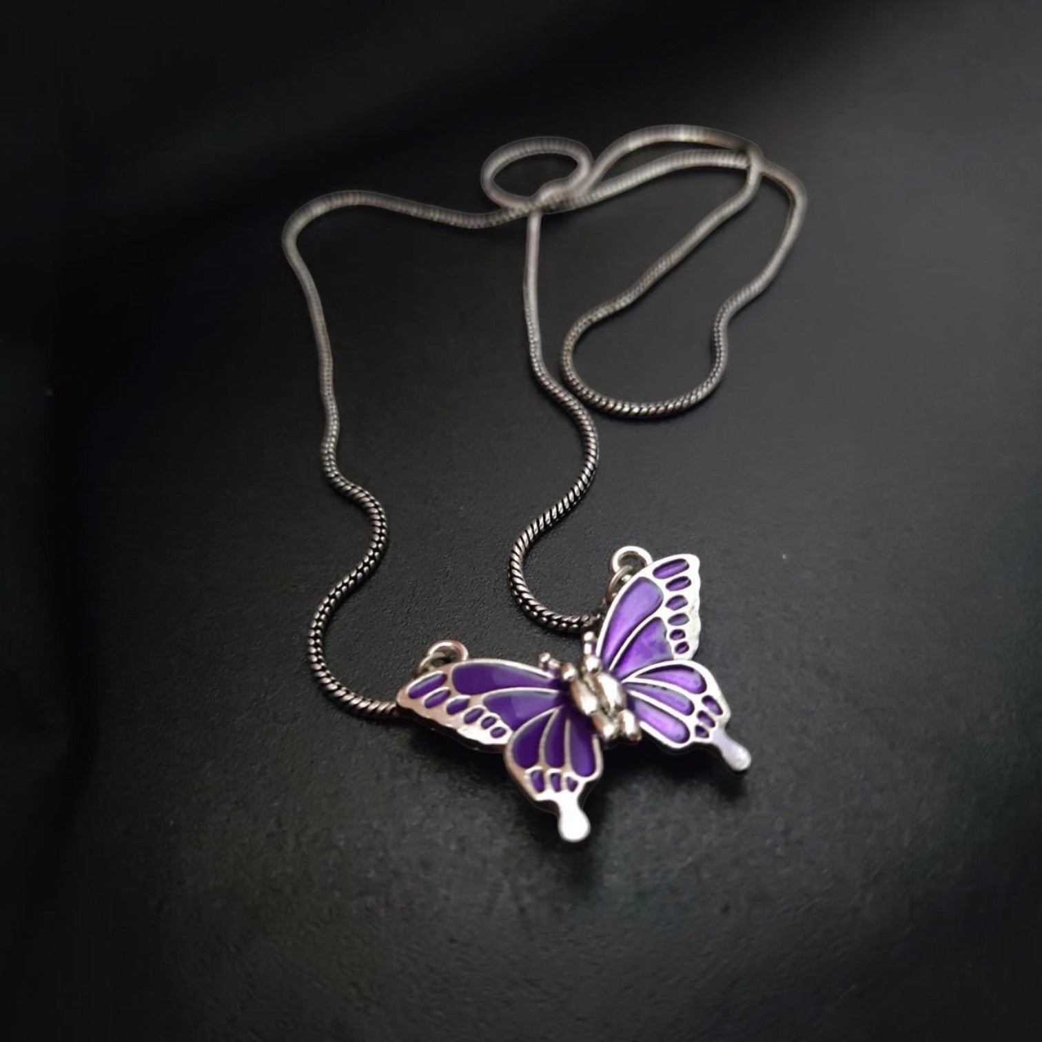 JewelOn purple enamel butterfly pendant necklace with silver chain. Magnetic closure.