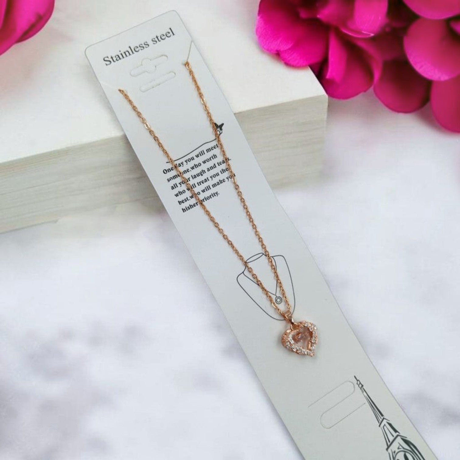 JewelOn Fashion Jewellery Store Online rose gold heart pendant necklace with clear stones on a delicate chain.