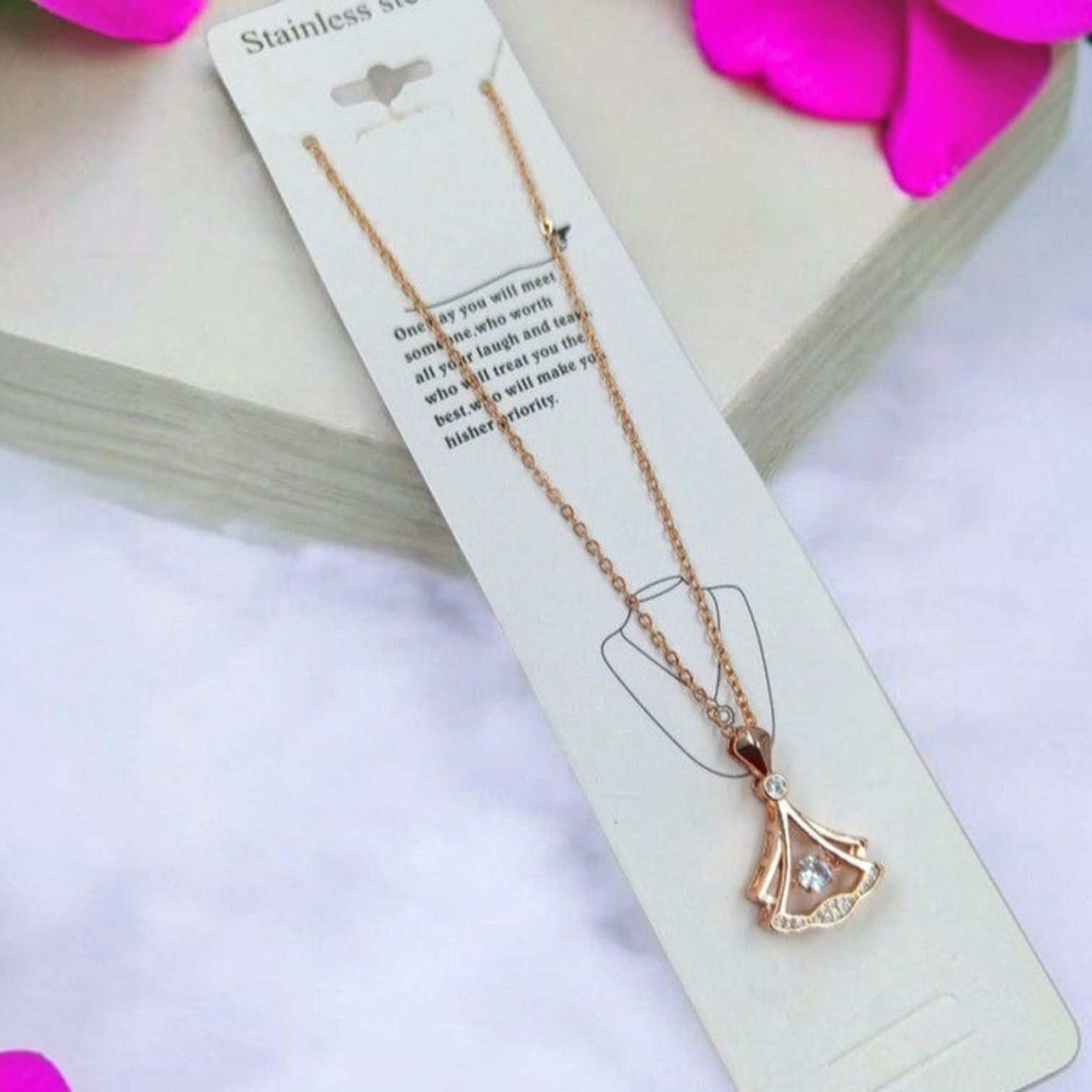 JewelOn Oviya Western Chic Embrace pendant necklace with rose gold chain and diamond accents.