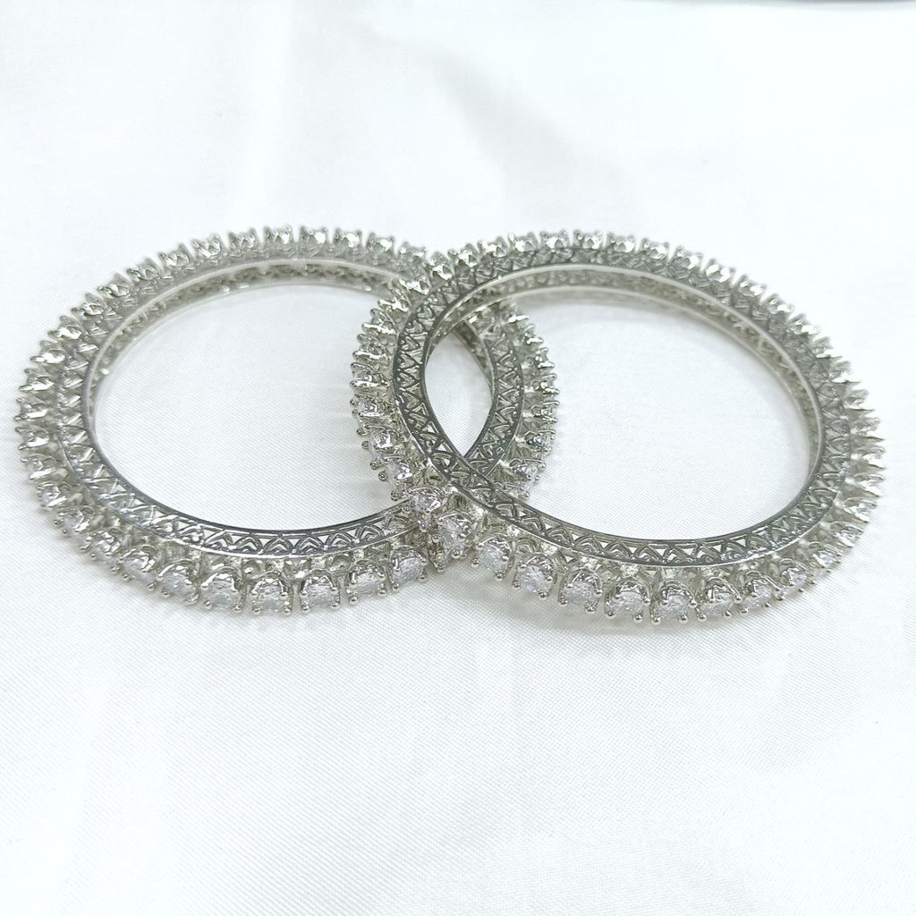 JewelOn Rajatrekha AD Silver Kada Bangle with clear cubic zirconia stones, silver-toned finish, intricate design.