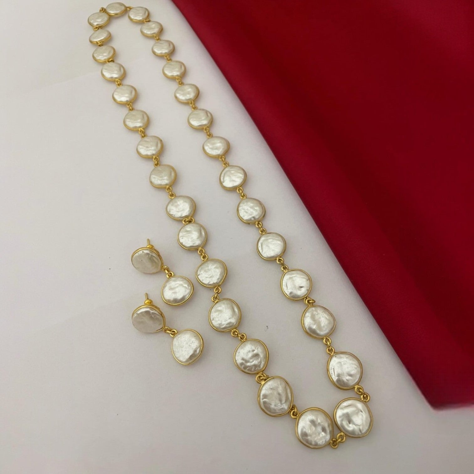 JewelOn Fashion Jewellery Store white MOP necklace and earrings set with gold-tone chain and settings.