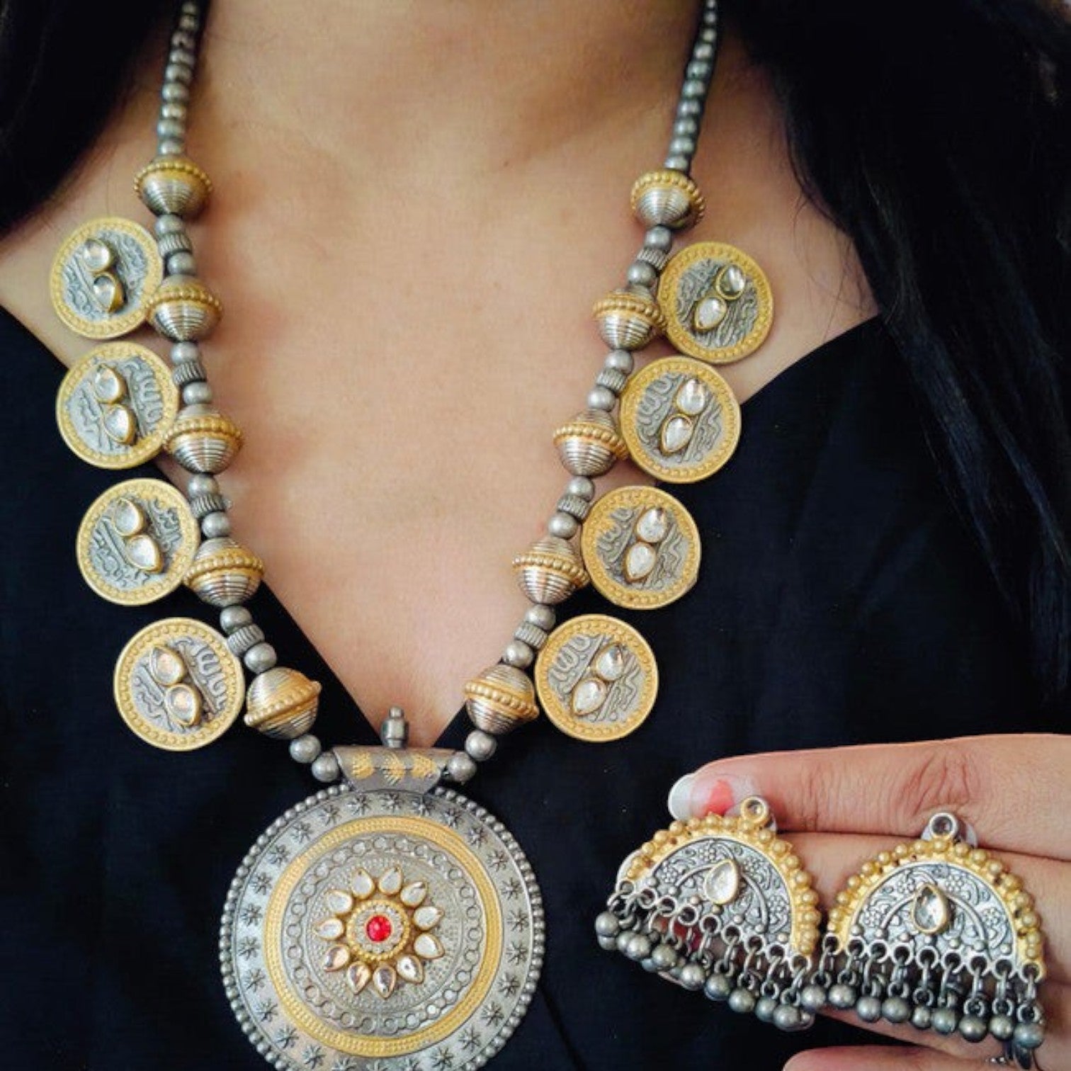 JewelOn 2-tone gold and silver necklace set with matching earrings, featuring coin motifs and a central pendant with red stone.