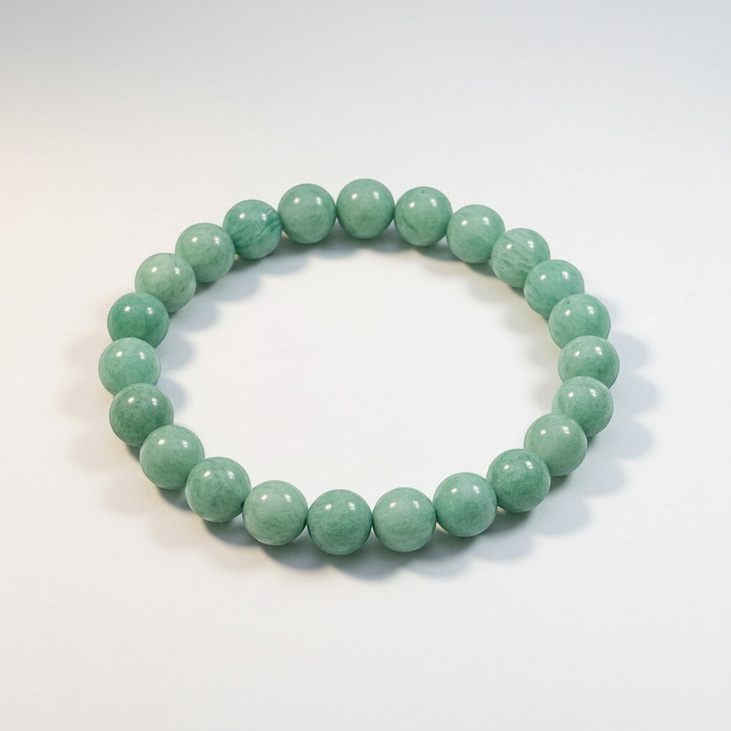 JewelOn Amazonite 8mm crystal bracelet for men and women, featuring smooth turquoise-green beads on an elastic band.