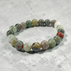JewelOn 8mm Bloodstone crystal bracelet with red and green marbled beads, unisex design for grounding and courage.