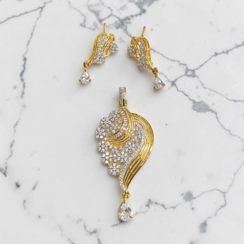 JewelOn gold-tone American Diamond pendant and earring set with teardrop and baguette stones.
