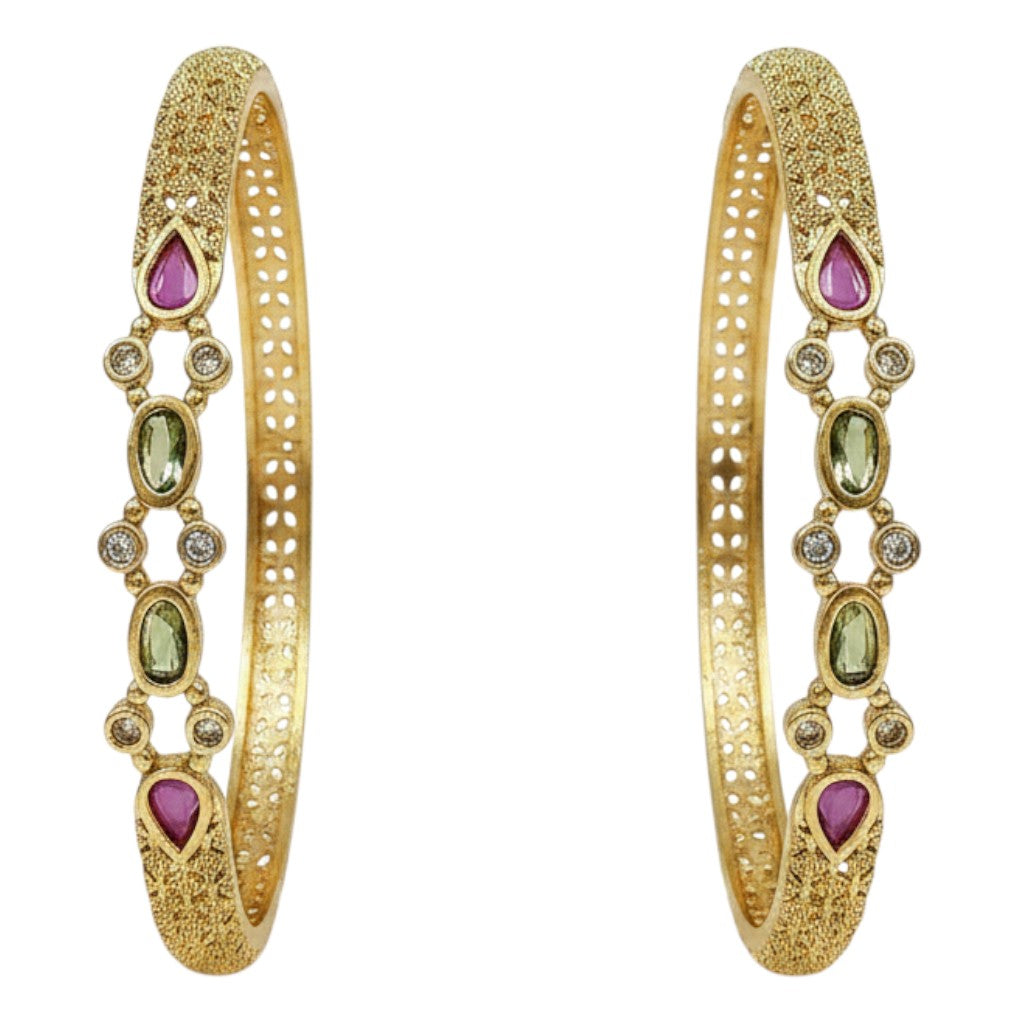 JewelOn gold plated bangles set for women, featuring intricate filigree work and teardrop-shaped pink and green stones with small clear crystals.