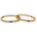 JewelOn Éclat gold plated bangles set for women featuring intricate cutwork and small purple stones with diamond accents.