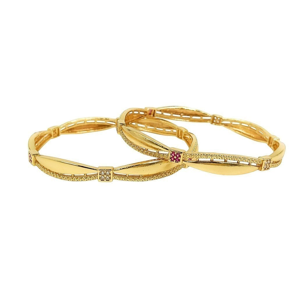 JewelOn gold plated bangles set with intricate detailing and small ruby and diamond accents.