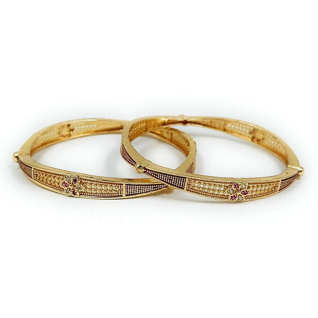 JewelOn gold plated bangles set for women, featuring intricate patterns and small red stones. Perfect for festive occasions.