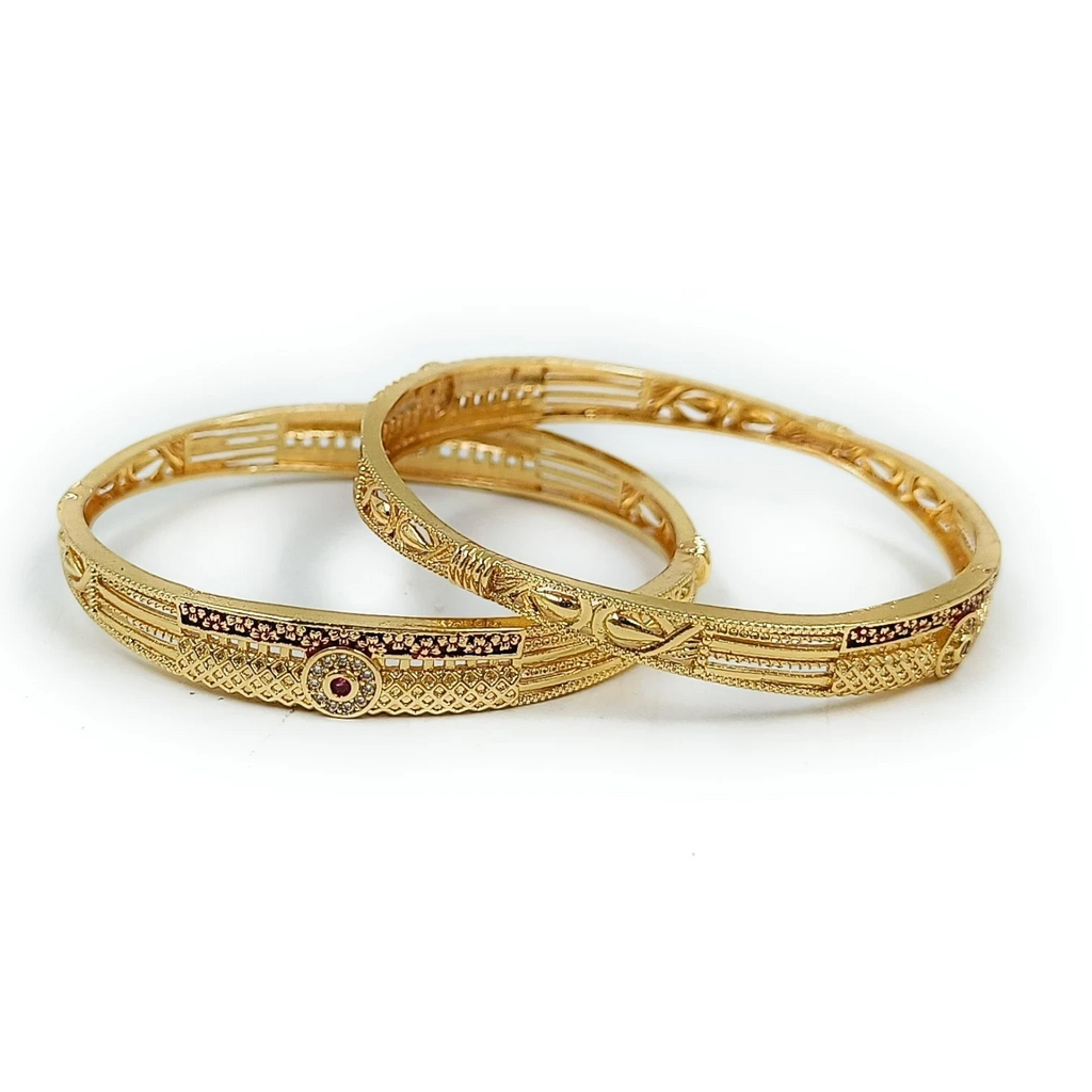 JewelOn Zoë gold plated bangles set for women, featuring intricate patterns and small red and clear stones.