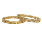 JewelOn Priya gold plated bangles set for women, featuring intricate patterns and small red stones. Traditional ethnic jewelry.