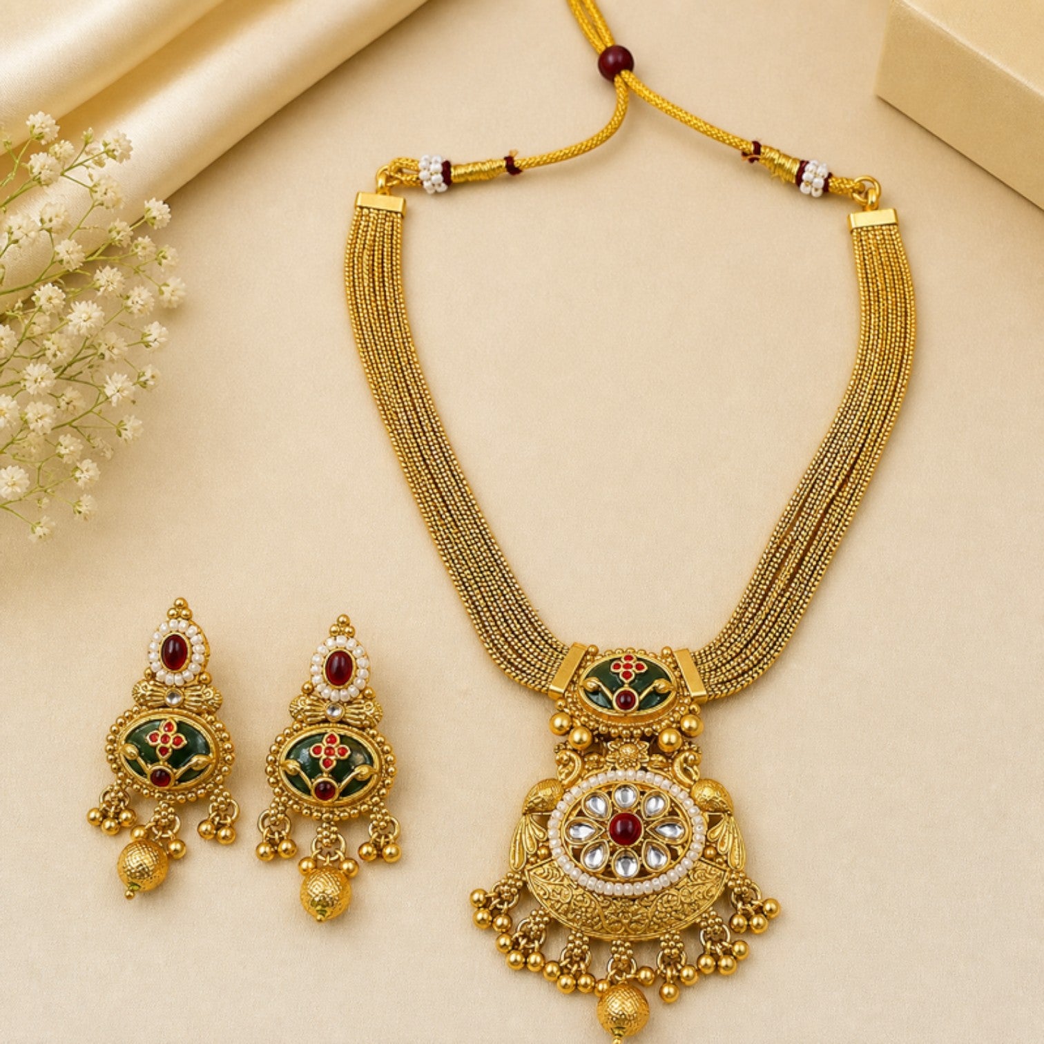 JewelOn Virasat heritage gold plated necklace and earrings set with red and green enamel details and pearl accents.