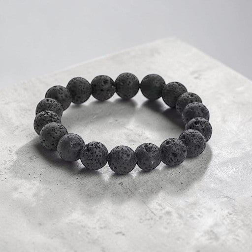 JewelOn black 8mm lava stone beaded bracelet for men and women, elastic band, natural porous texture.