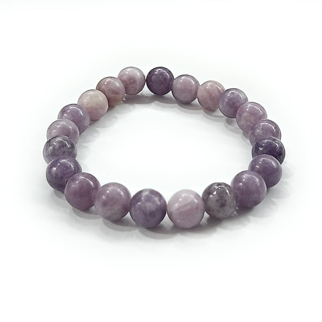 JewelOn 8mm lepidolite crystal bracelet with smooth, polished lilac and lavender beads on an elastic band.