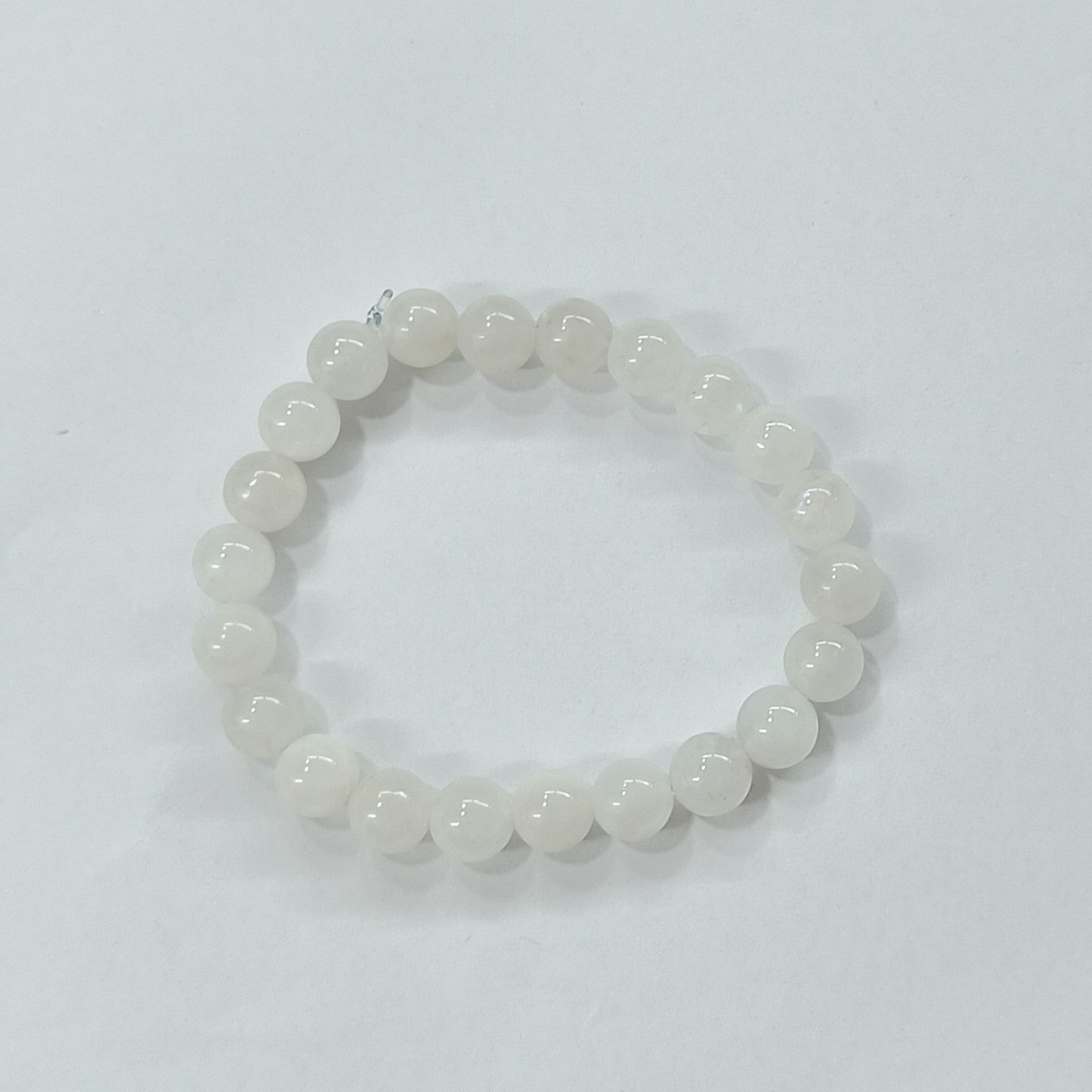 JewelOn white 8mm moonstone crystal beaded bracelet for men and women, strung on elastic cord.