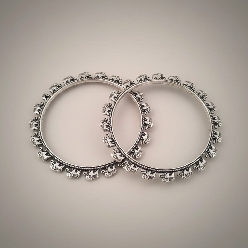 JewelOn stylish oxidised silver bangles with elephant motif, size 2.6, for women.