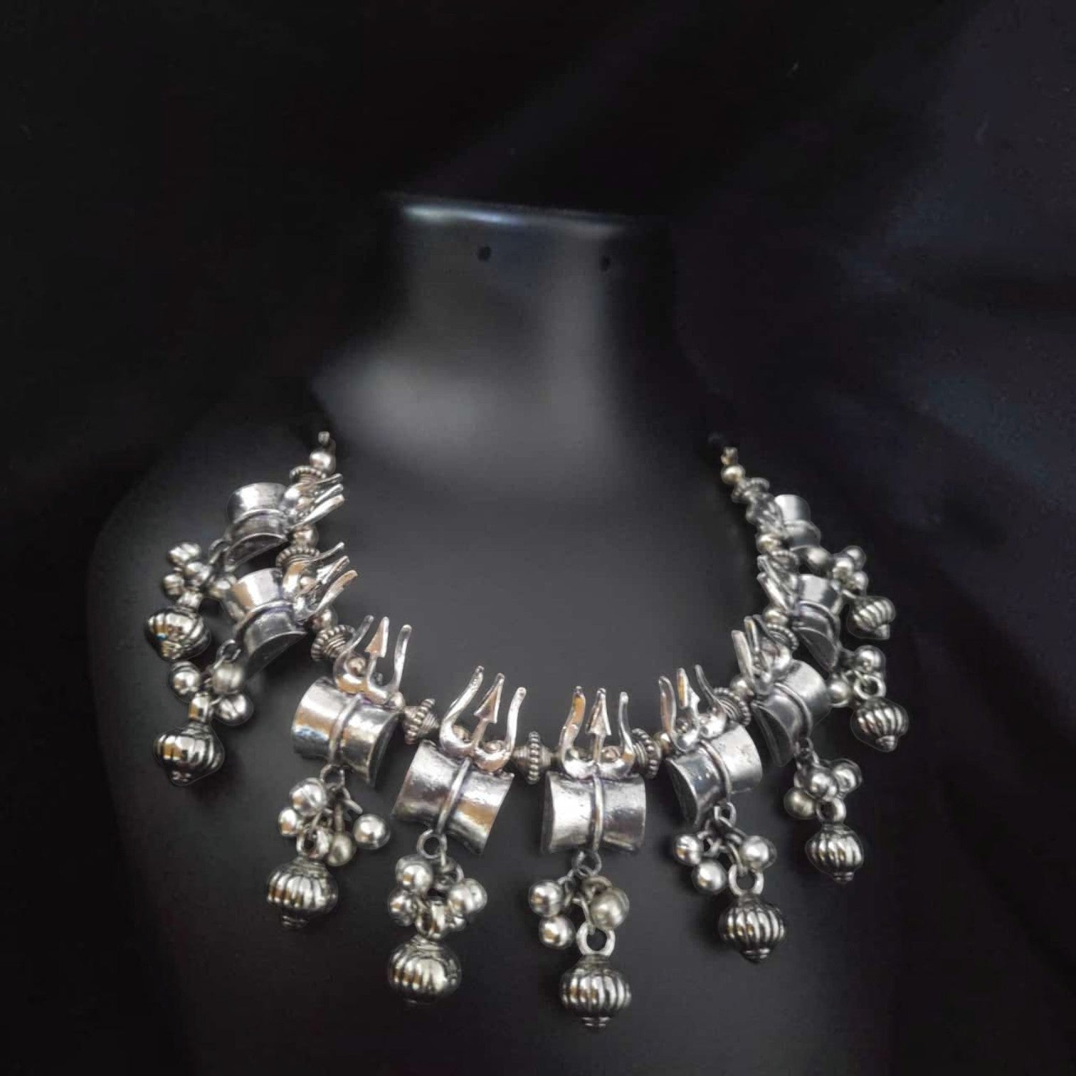 JewelOn lustrous finish oxidised trishul necklace with dangling ghungroos and beads. Traditional Indian jewellery.